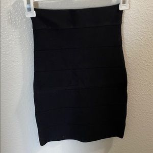 BEBE size Small. Black tight skirt